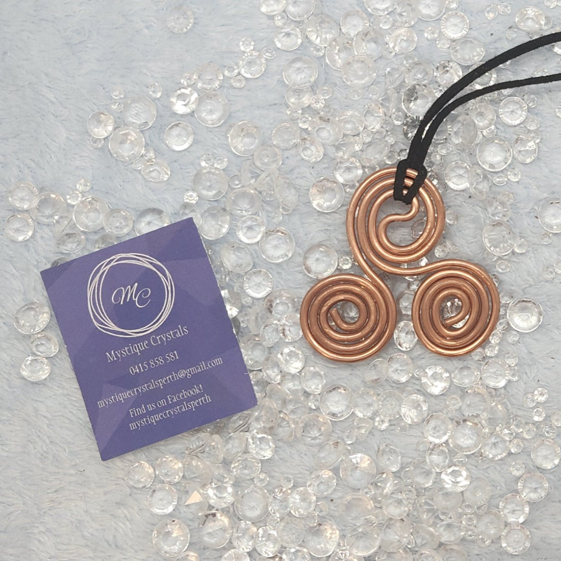 Copper Triskellion Necklaces